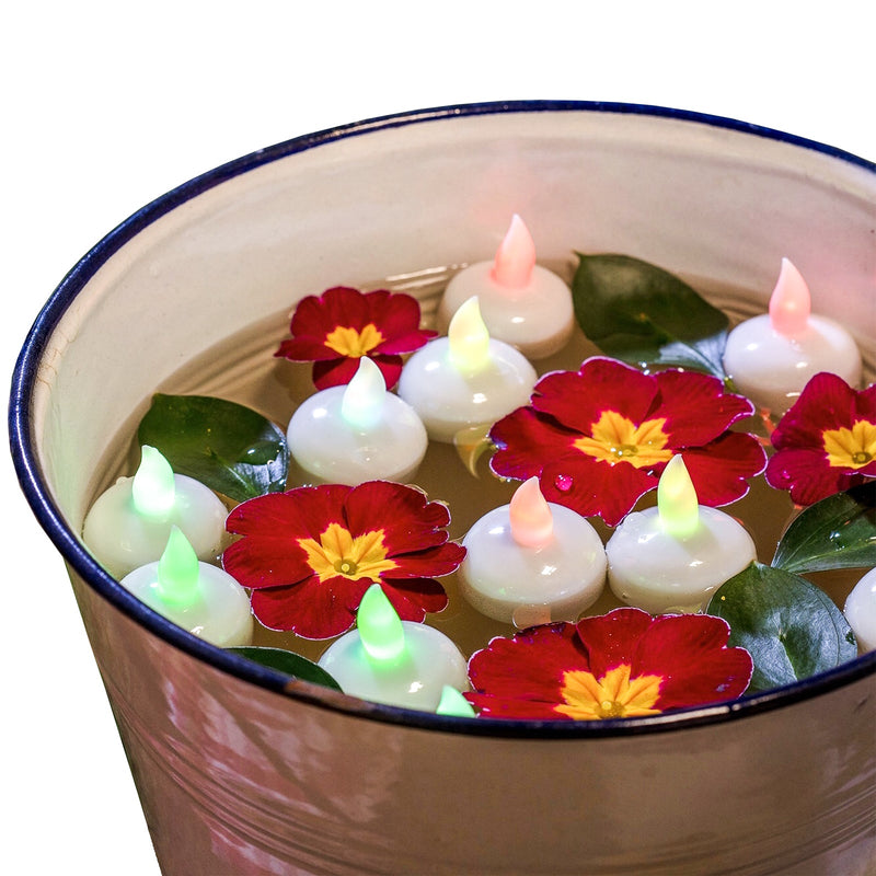 Set 4 candeline multicolor  tea light galleggianti con led RGB e batterie incluse.