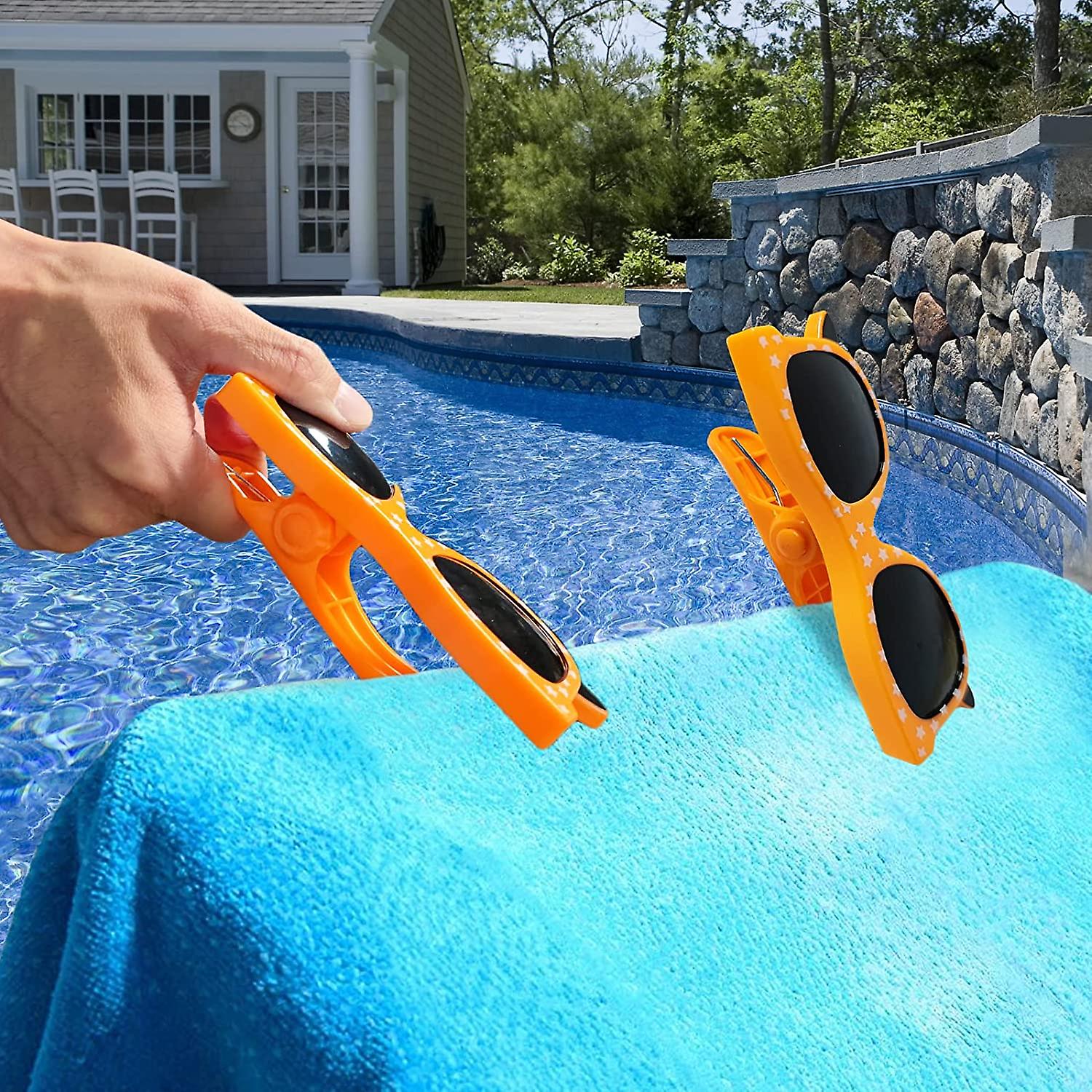 Set 2 mollette antivento, animali in plastica per fissaggio telo mare