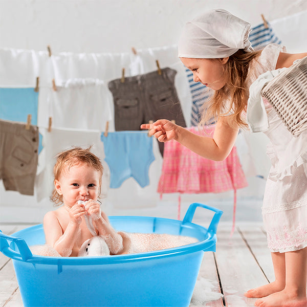 Bacinella ovale in plastica bianca per uso casalingo con due manici