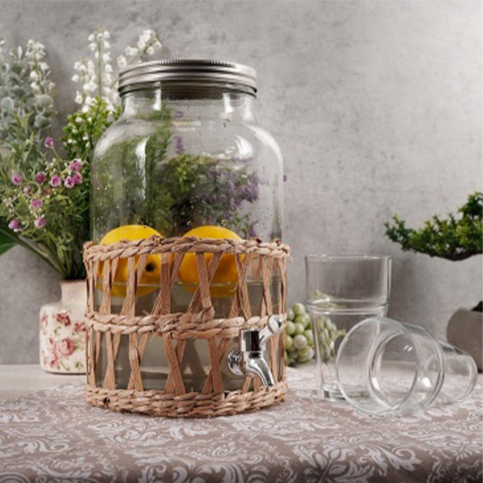 Caraffa in vetro porta bevande con rubinetto e rivestimento in Rattan 5,5 lt