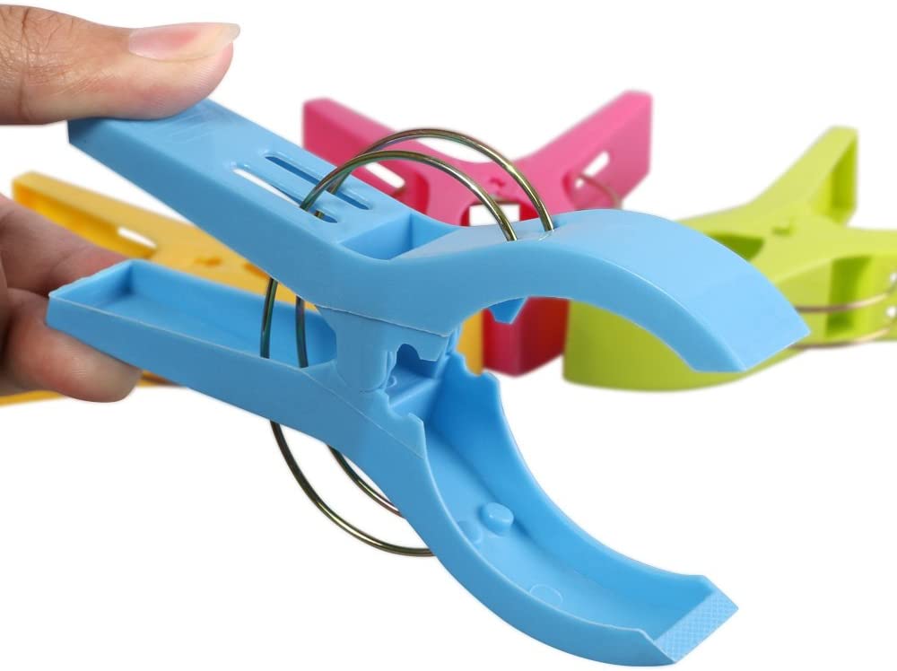 Set 4 mollette antivento in plastica per fissaggio telo mare