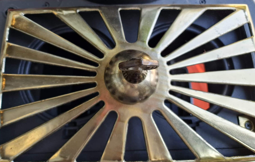 Stufa a legna "Parlor" 6 kW in ghisa con inserti ottone caminetto vintage