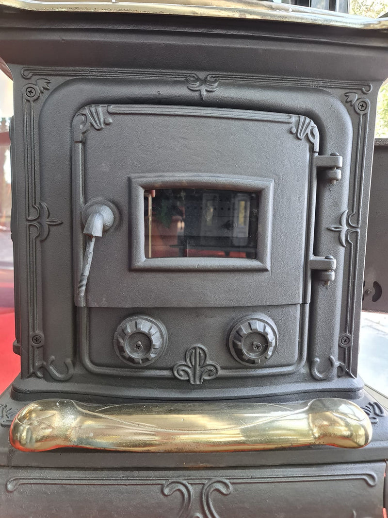 Stufa a legna Parlor 6 kW in ghisa con inserti ottone caminetto vint –  Lazappa.com