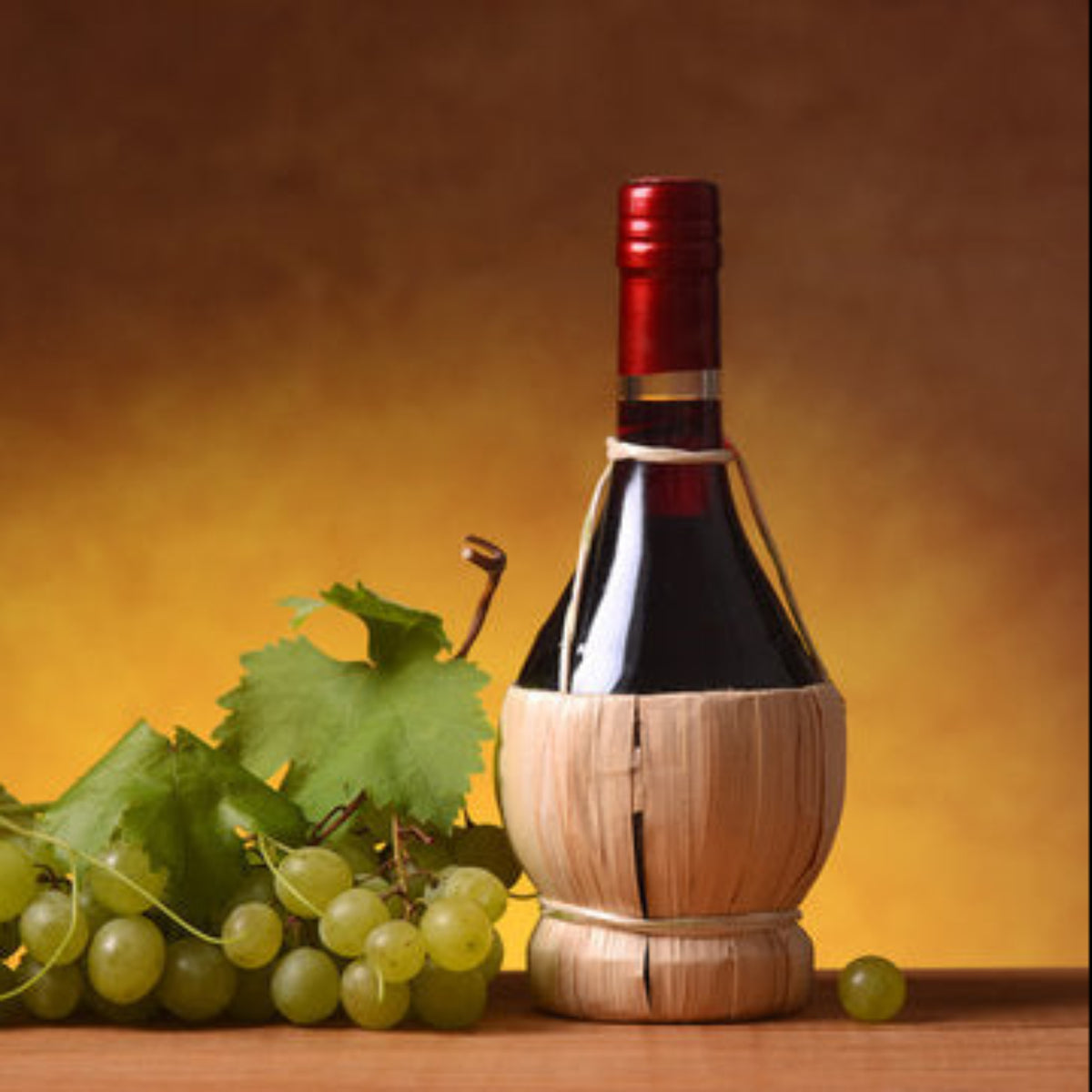 Fiasco in vetro rivestito in paglia per conservazione vino alcolici e distillati